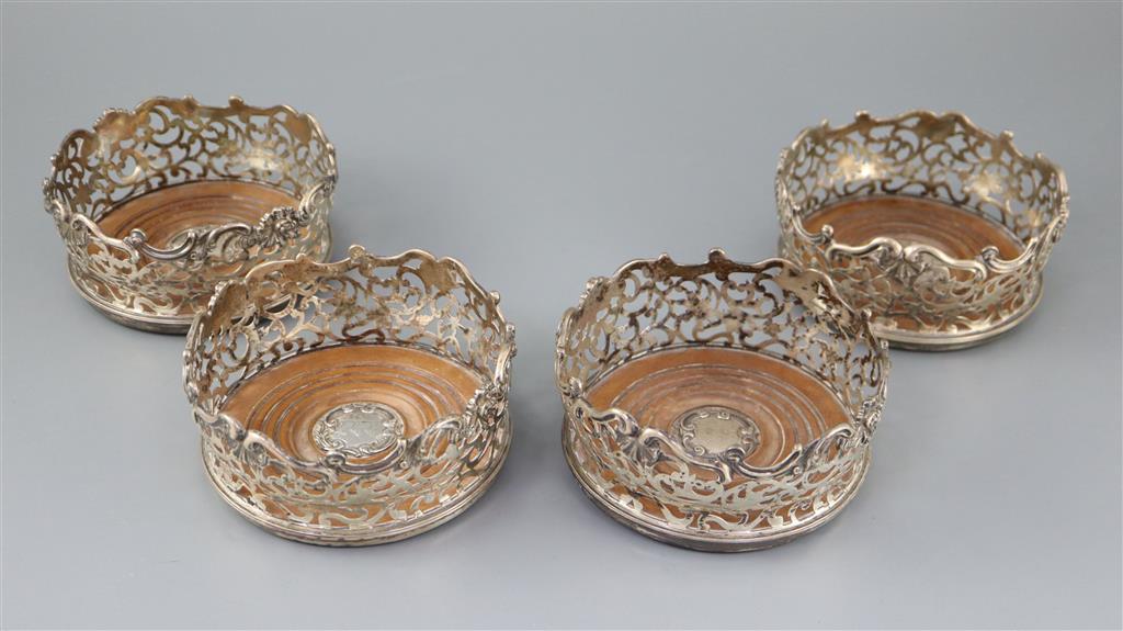 A good set of four early Victorian pierced silver wine coasters, by Joseph Angell I and Joseph Angell II,